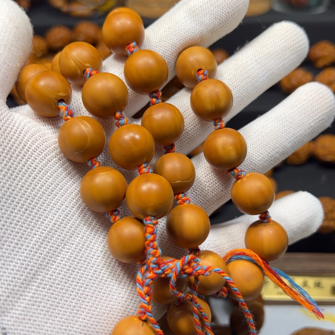 牛***儿橄榄核手串/手链1.5正圆脖挂