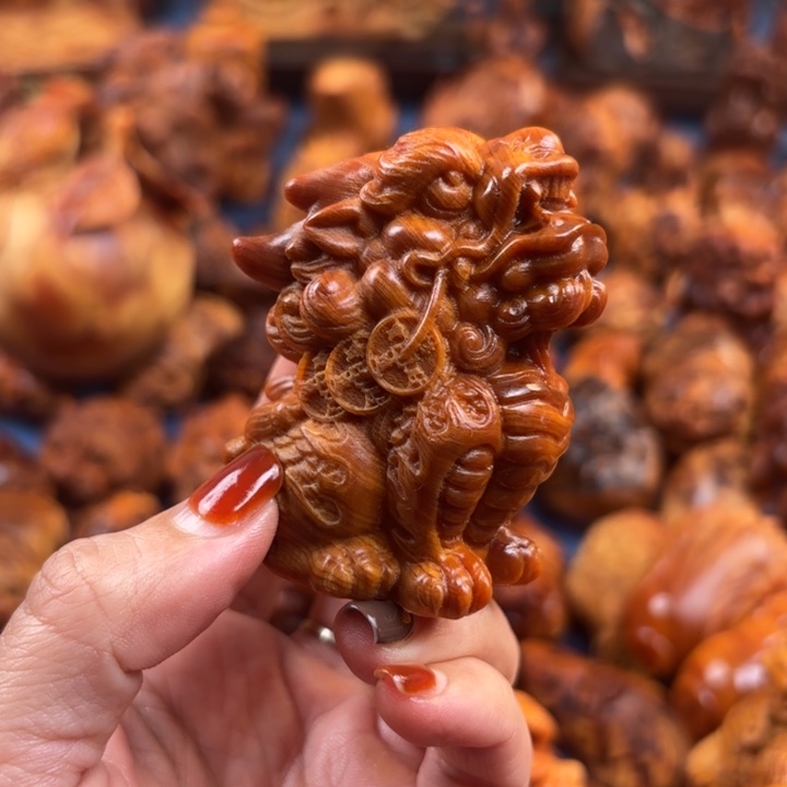 雄***袓太行崖柏手把件的设计和制作