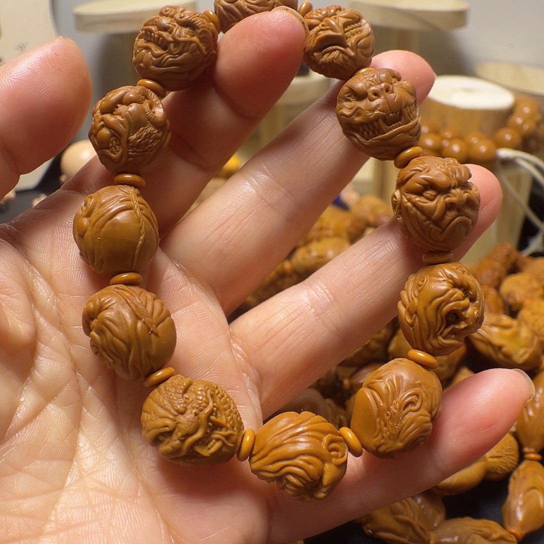 橄榄核手串weryyu