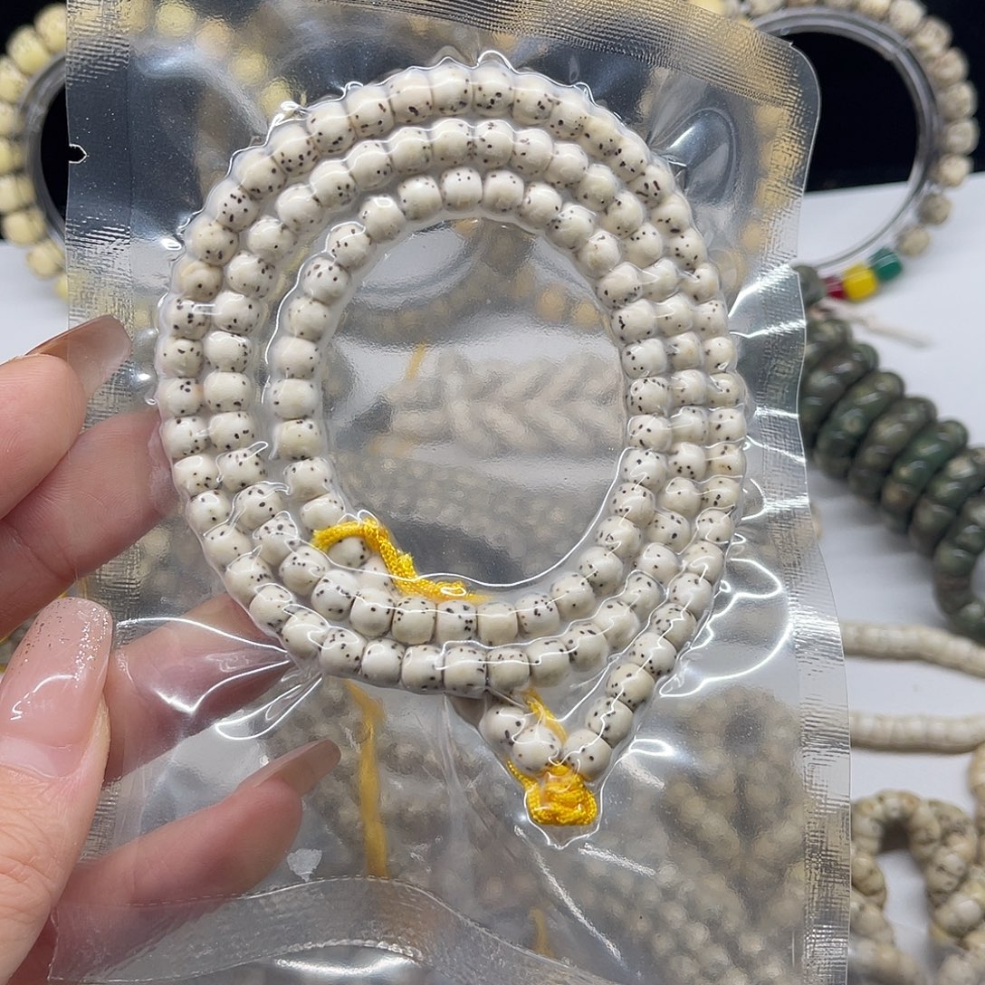 呆****6*5原生态骨瓷白长串桶珠