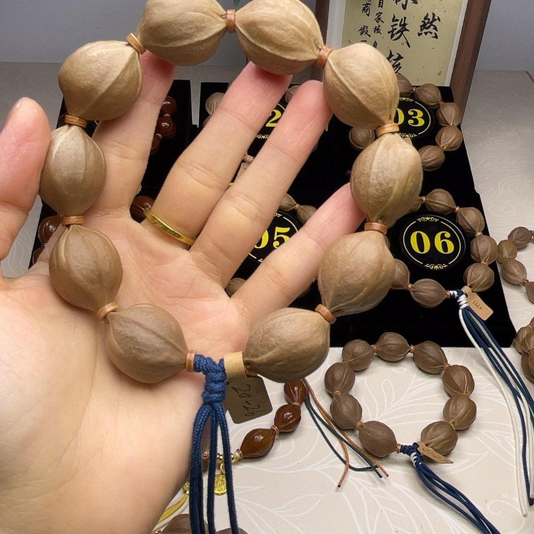会***长手串橄榄核梅林铁核20*26