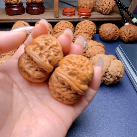 文玩核桃手串拳**兽元宝