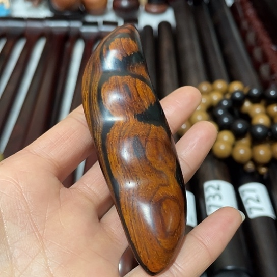 往***事木红酸枝豆角一个