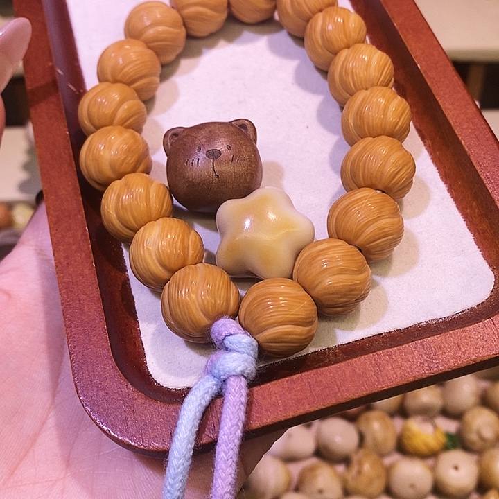 *****手串猴头核桃全品卷卷酥小手持 星星背云紫蓝流苏