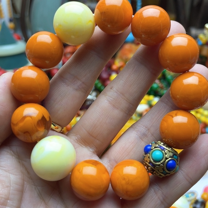 树脂制品83号橘色手串