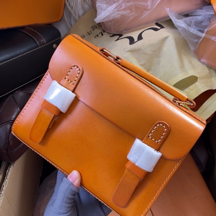 头层牛皮瑕疵单肩包