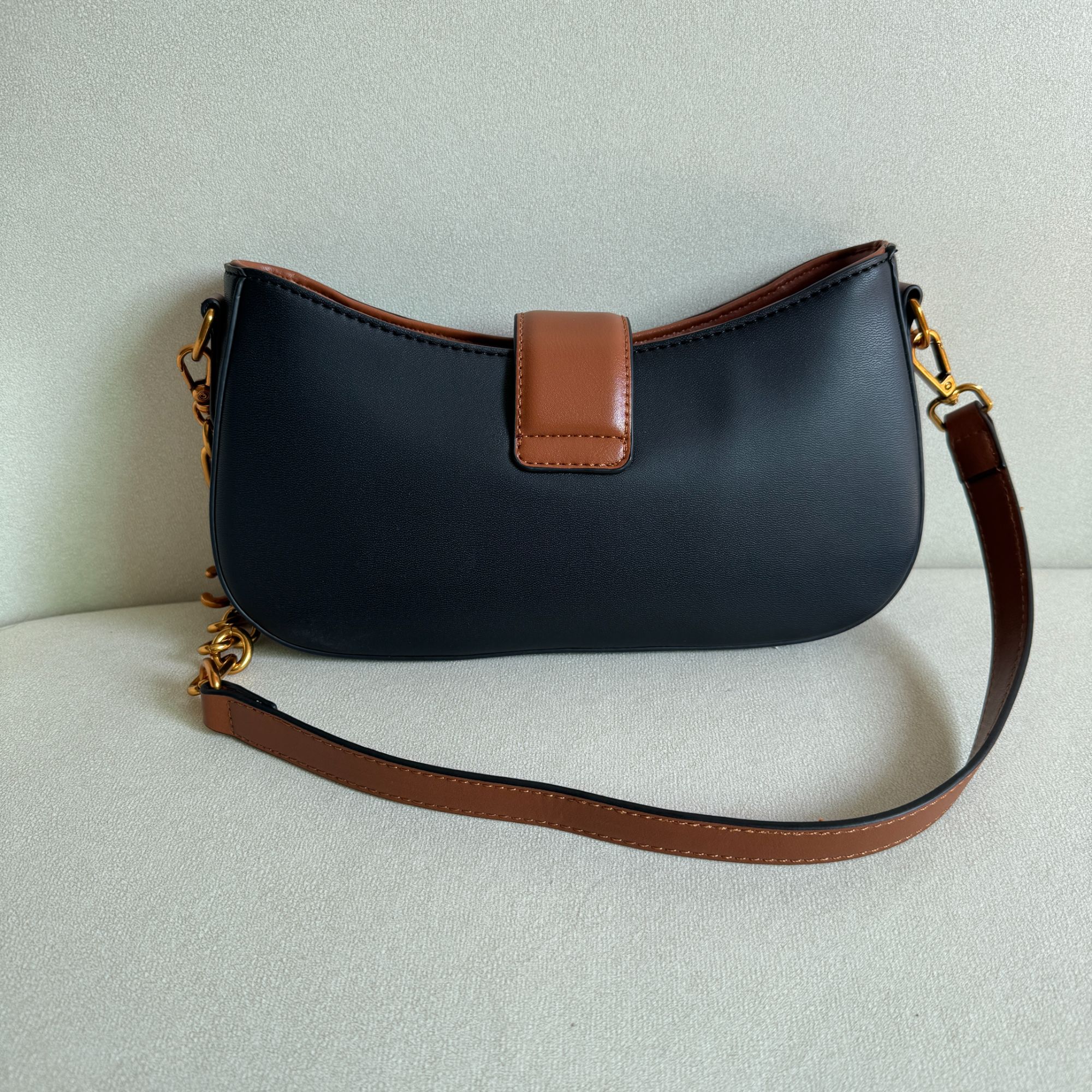 新款女包双拼棕花花-腋下包