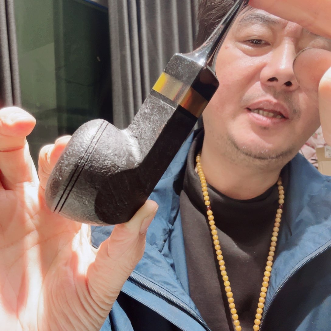 北*星焦耀烟斗一直斗