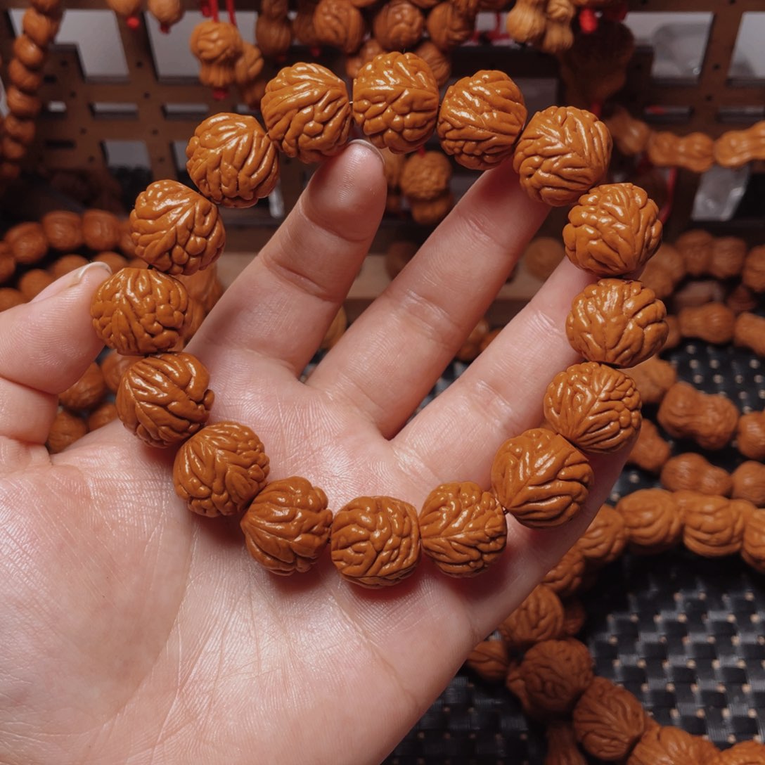 木质类龙纹桃枭手串