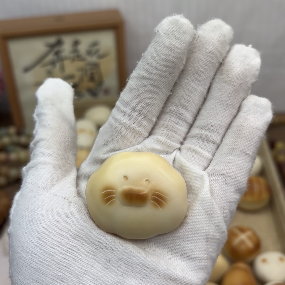 吊坠菩提根/象牙果牙果海狮云朵把件702