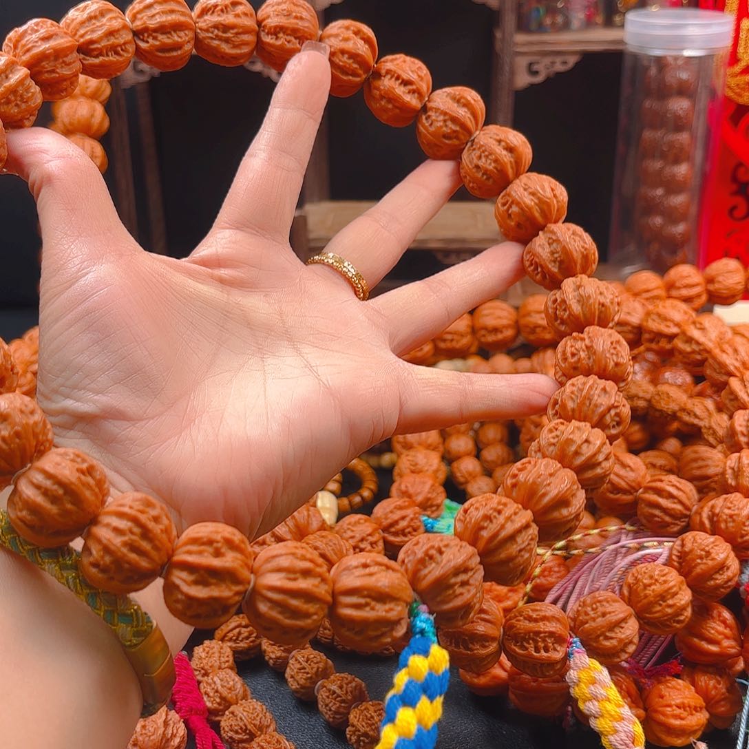 文玩核桃吊坠燊****球核桃手持