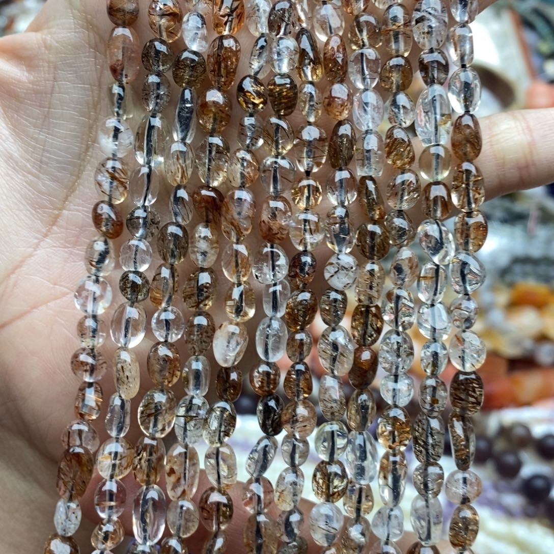 玛瑙/玉髓未镶嵌珠宝半成品一条纯天然黑金超七水晶糖豆随行