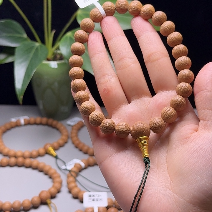 H***涵猴头核桃吊坠凤羽