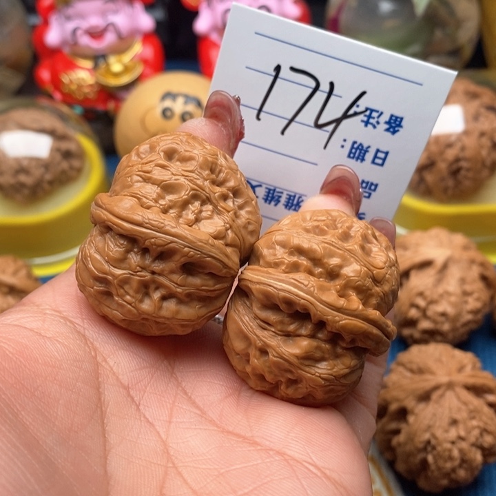 文玩核桃把件红**火174号39平谷元宝