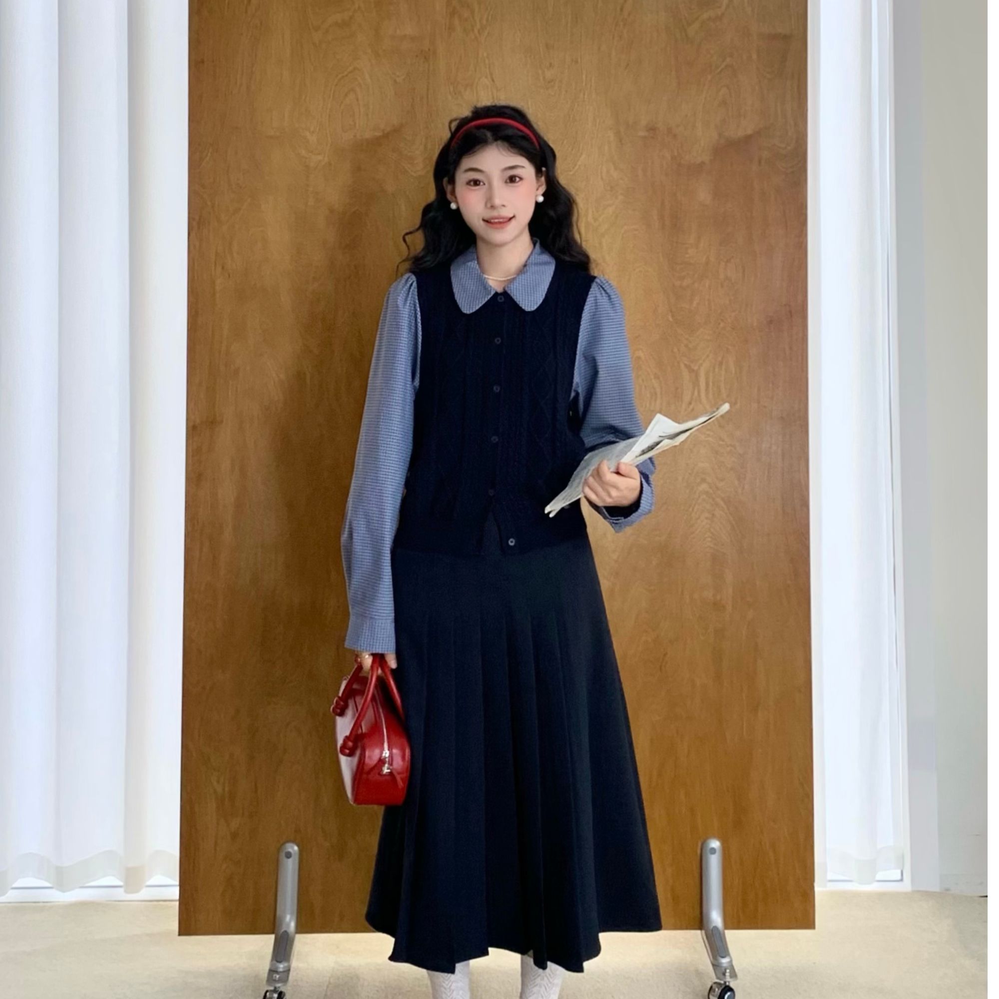 张汽水藏蓝格纹假两件针织毛衣娃娃领上衣Z18746