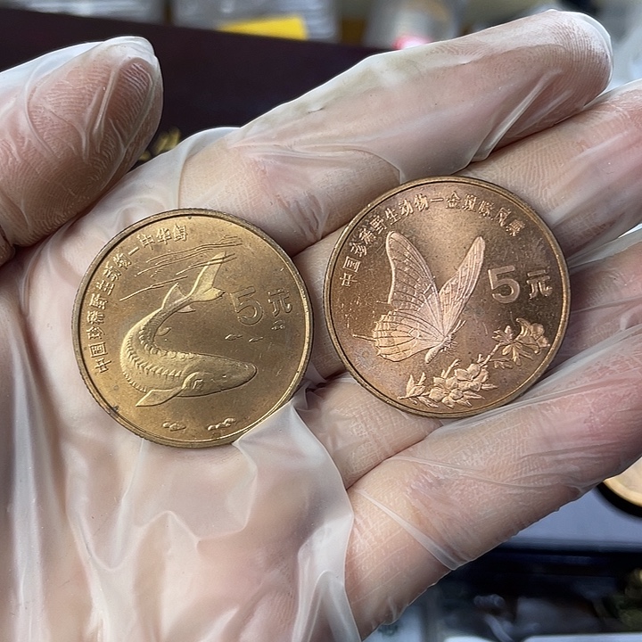 其他普通金属微氧化的99动物币一对 