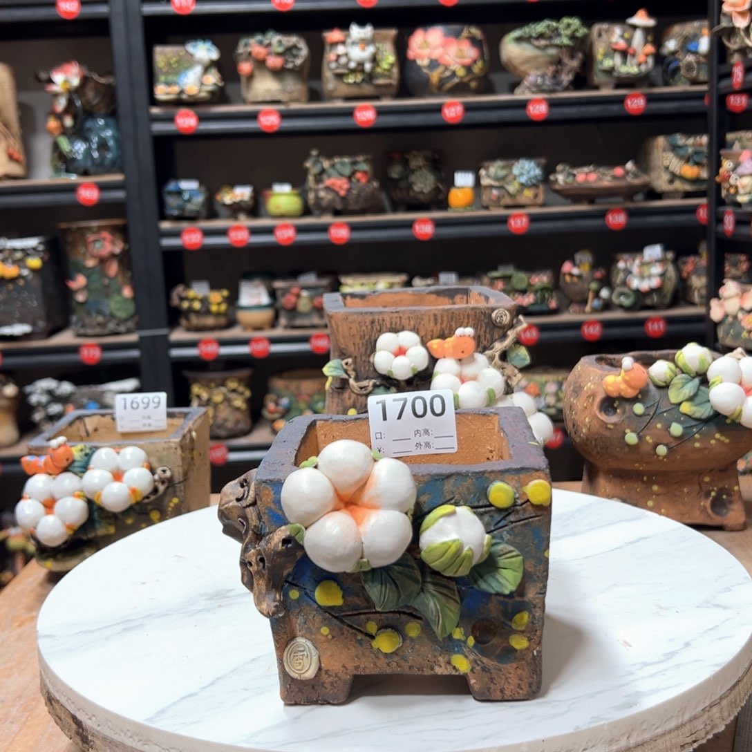 陶1700号，口9高9.5