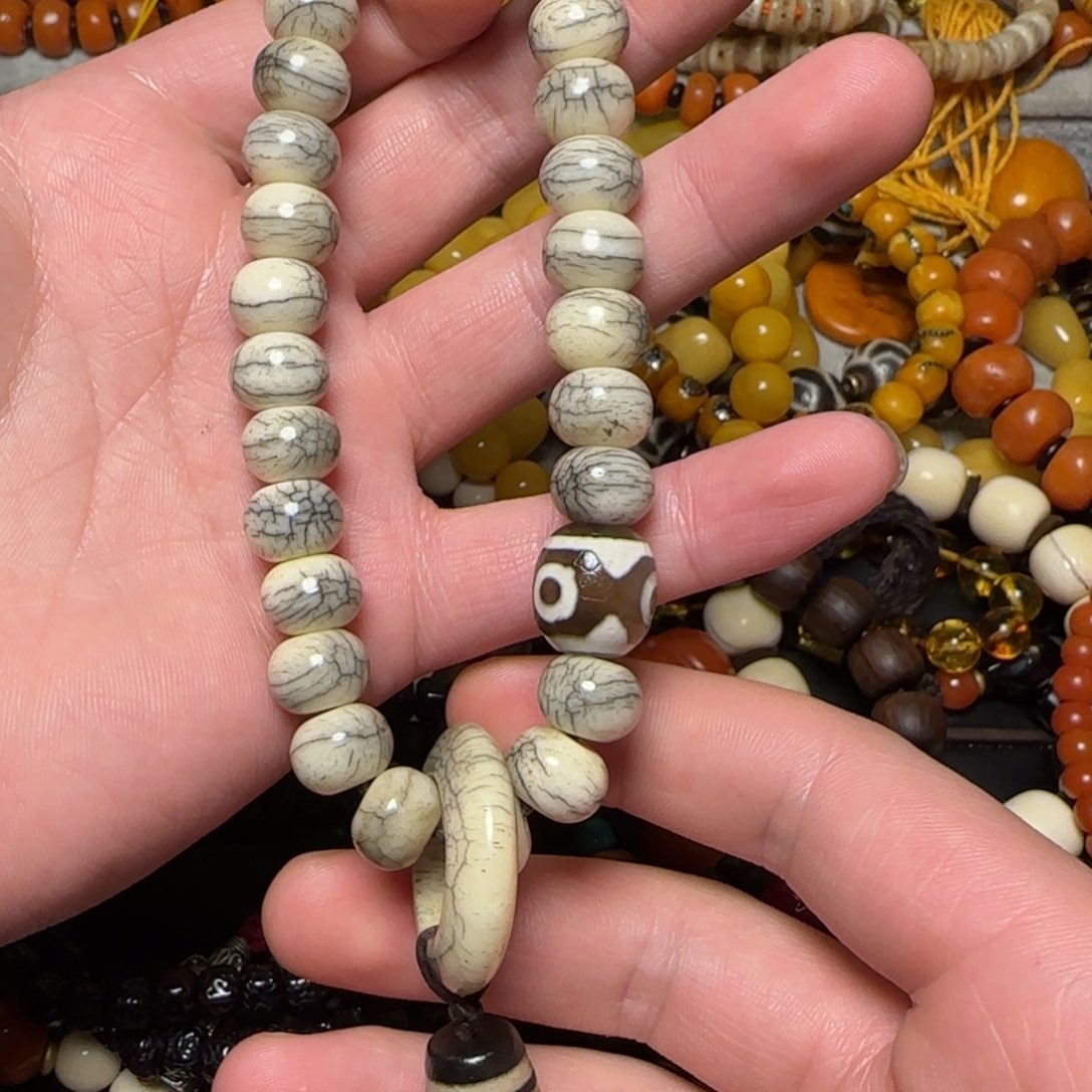 藏传古珠手持骨骨