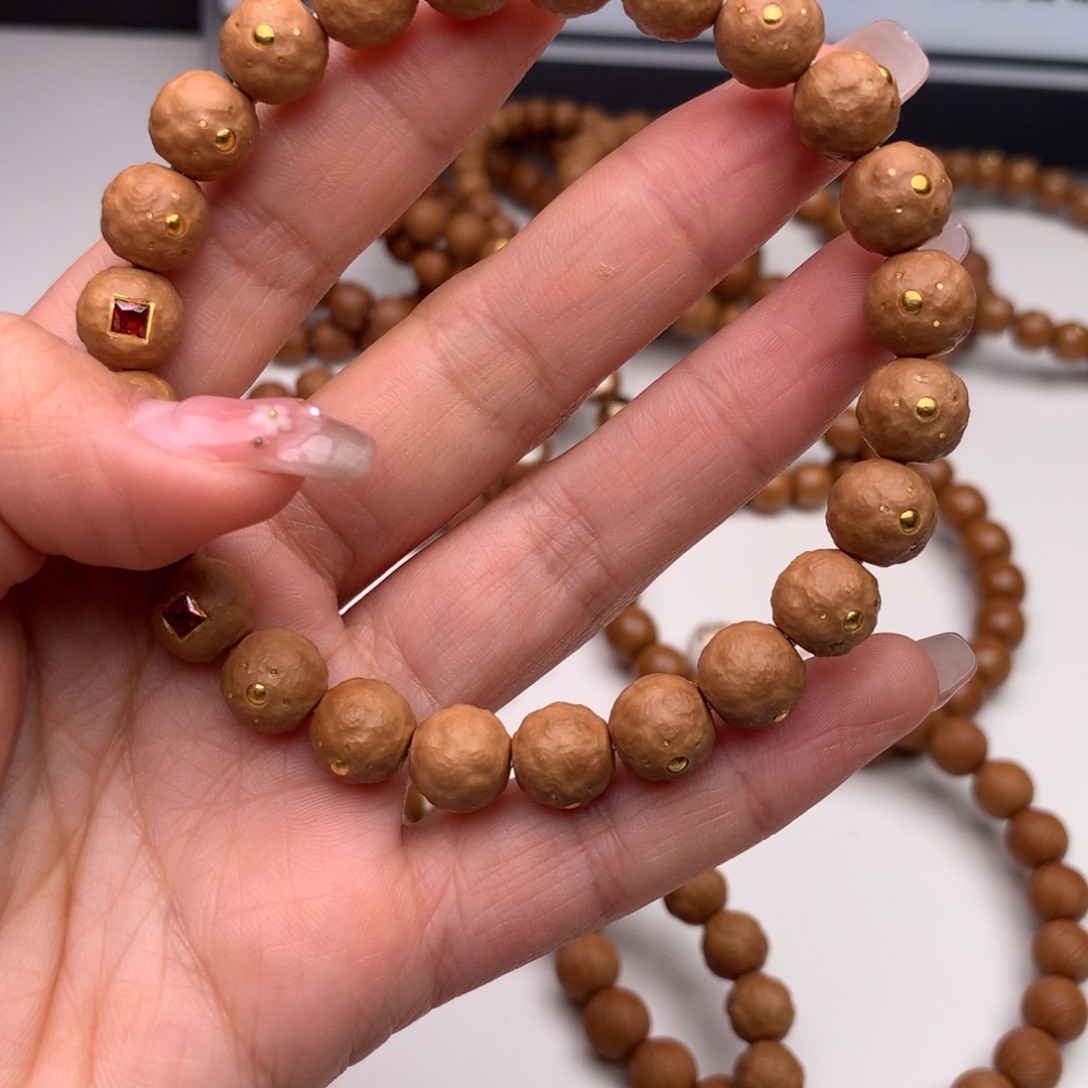 明***石手串猴头核桃满镶舍利