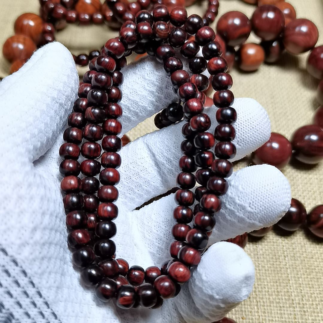 黄花梨/降香黄檀其他钟*贝海黄老料6*7多圈手串