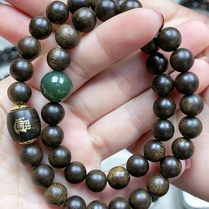 沉香手串安****司越南芽庄白奇楠沉水料