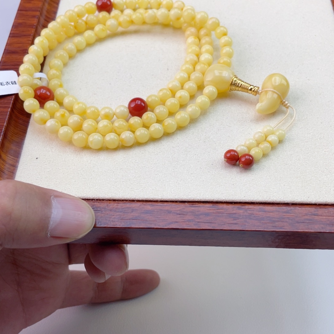 萌***兰蜜蜡未镶嵌手链蜜蜡佛珠26.6克