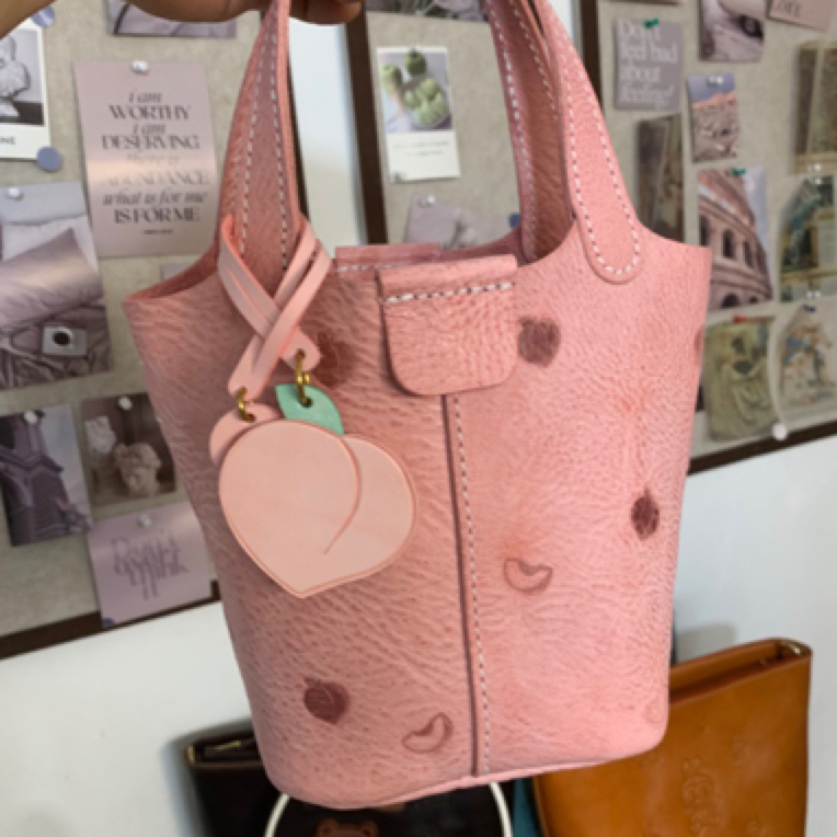 菜篮子手拿包头层牛皮