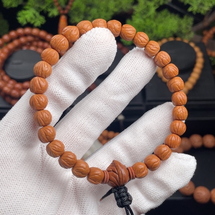 浅***~桃核吊坠精品手持