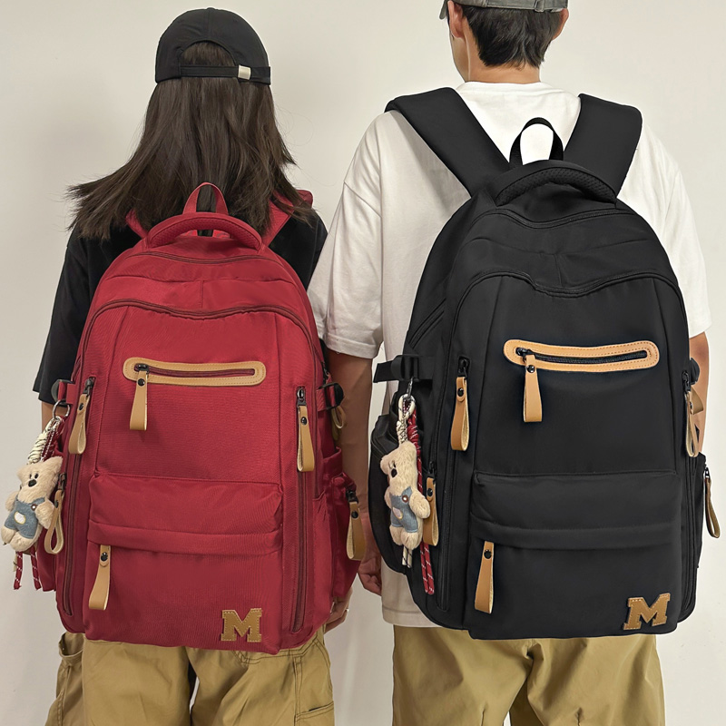 高颜值纯色情侣双肩包减负护脊大容量学生书包初中高中大学男女款