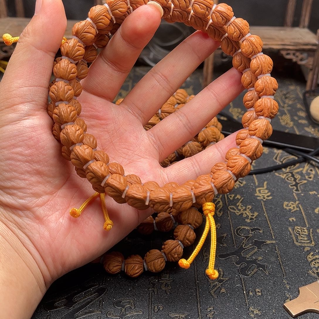 桃核吊坠玉龙手持