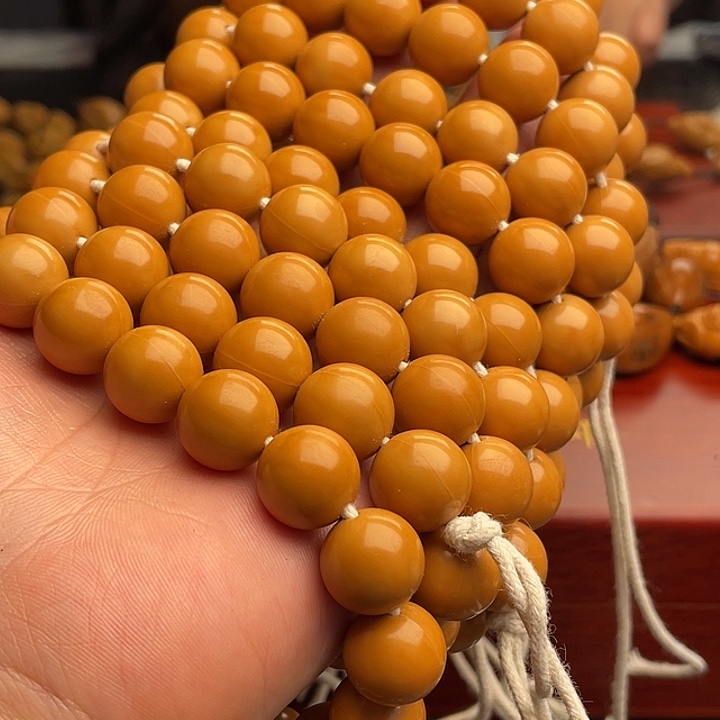 橄榄核吊坠猴头手串