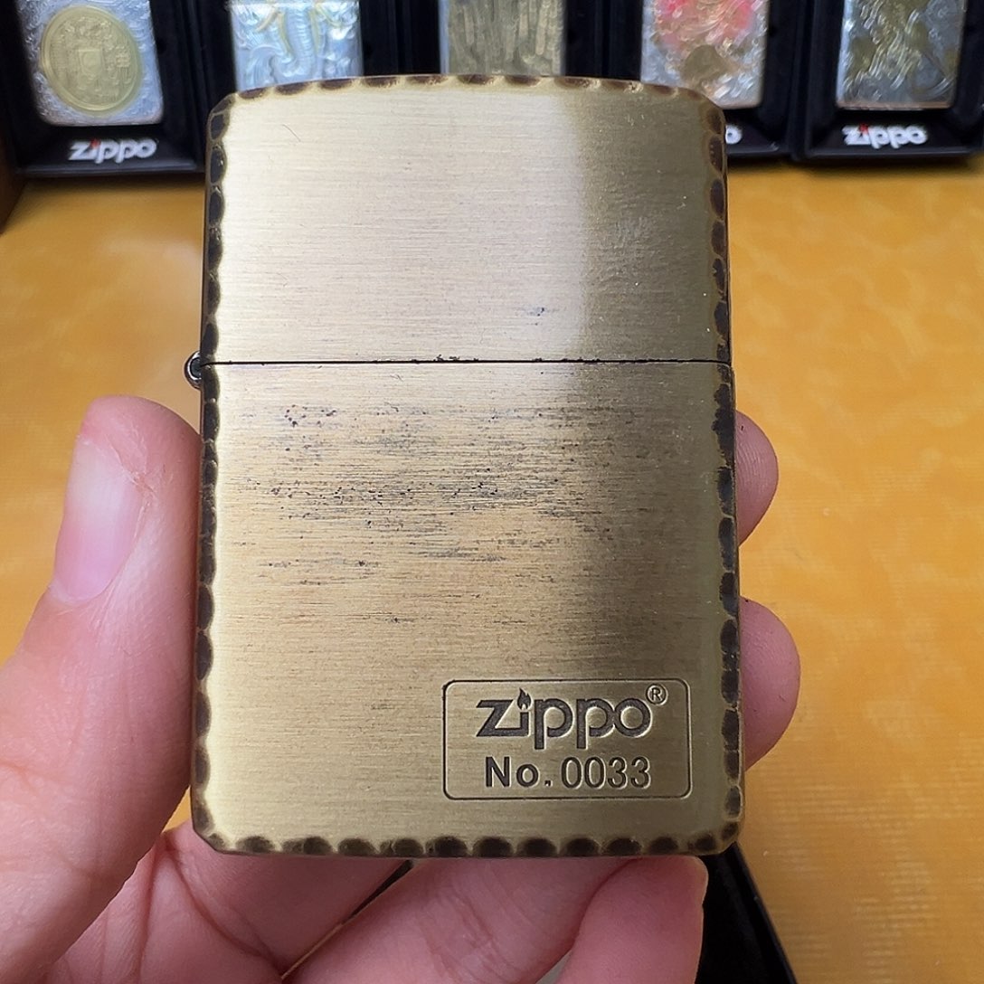 铜牙边盔甲打火机