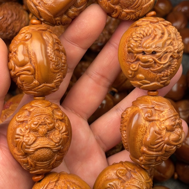 橄榄核手串博**头橄榄核手持