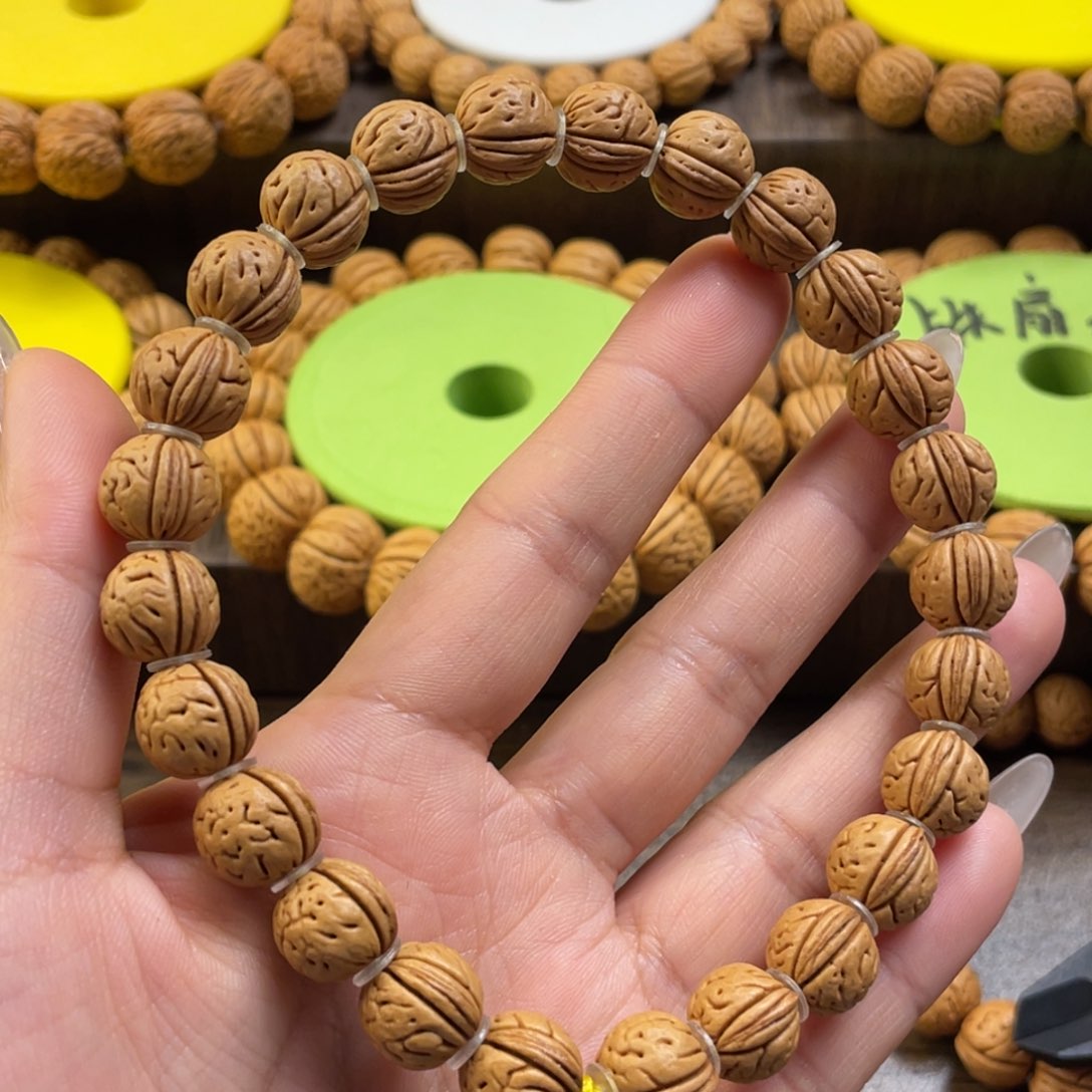 桃核手串时****q野生三棱