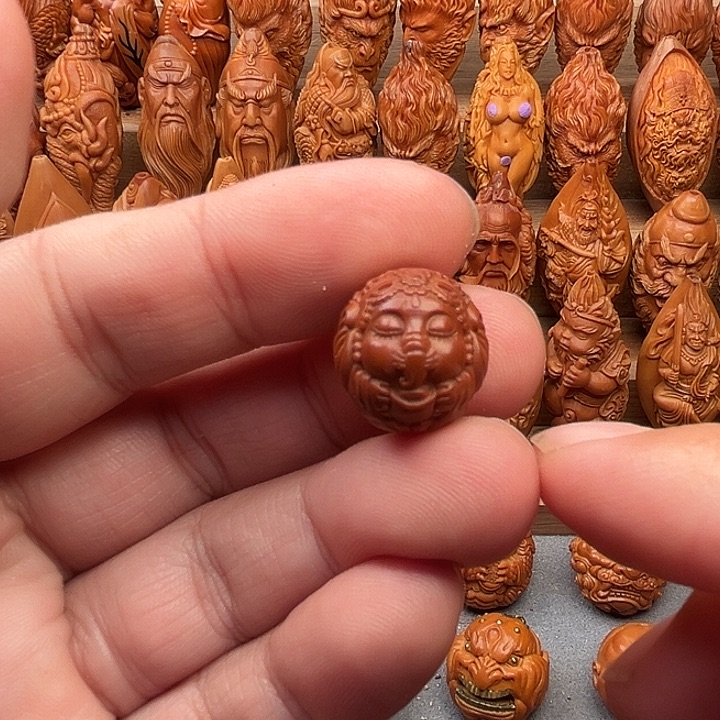 一***狮橄榄核吊坠16象宝