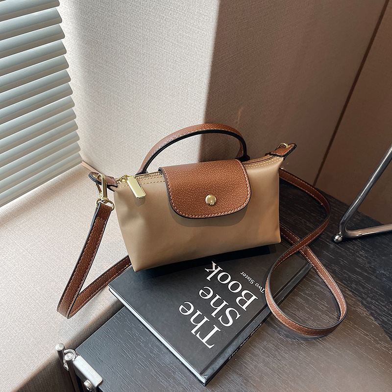 秋冬新款手提饺子包尼龙布气质百搭单肩斜跨飞机包小包女包