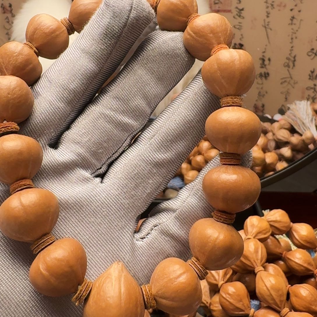 吕***品橄榄核手串南瓜籽