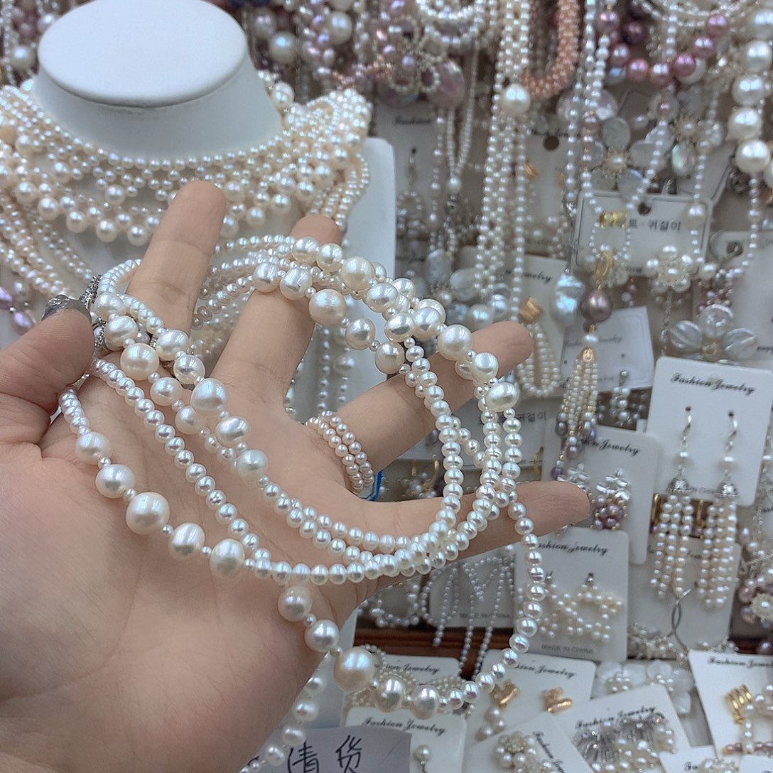 小***人银S925镶嵌淡水珍珠耳饰