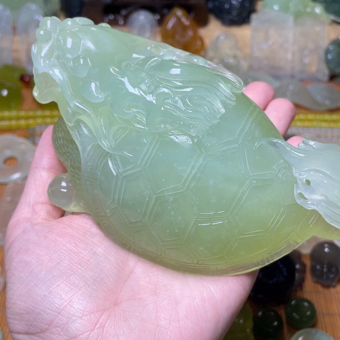 蛇纹石玉手把件未镶嵌强**弹