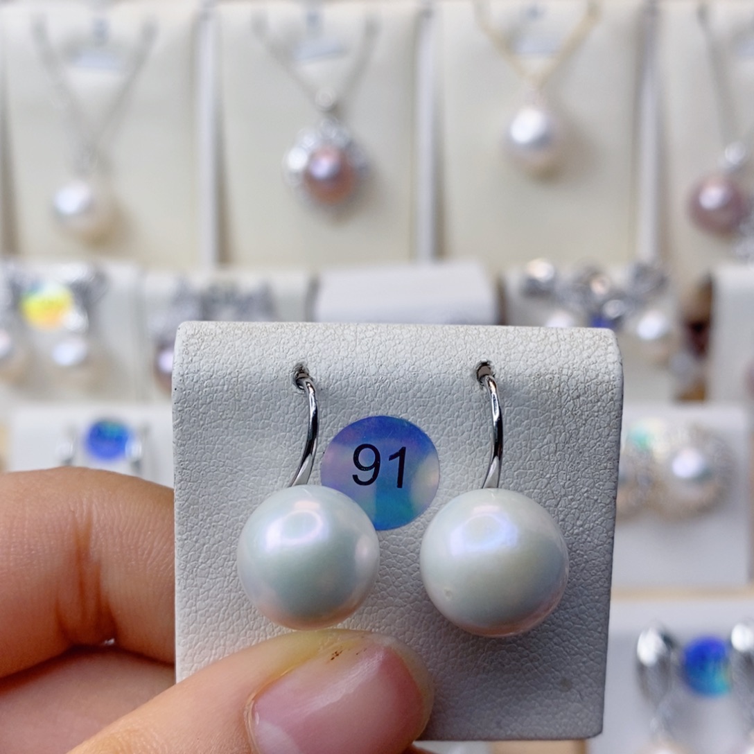 淡水珍珠耳饰合金江****七