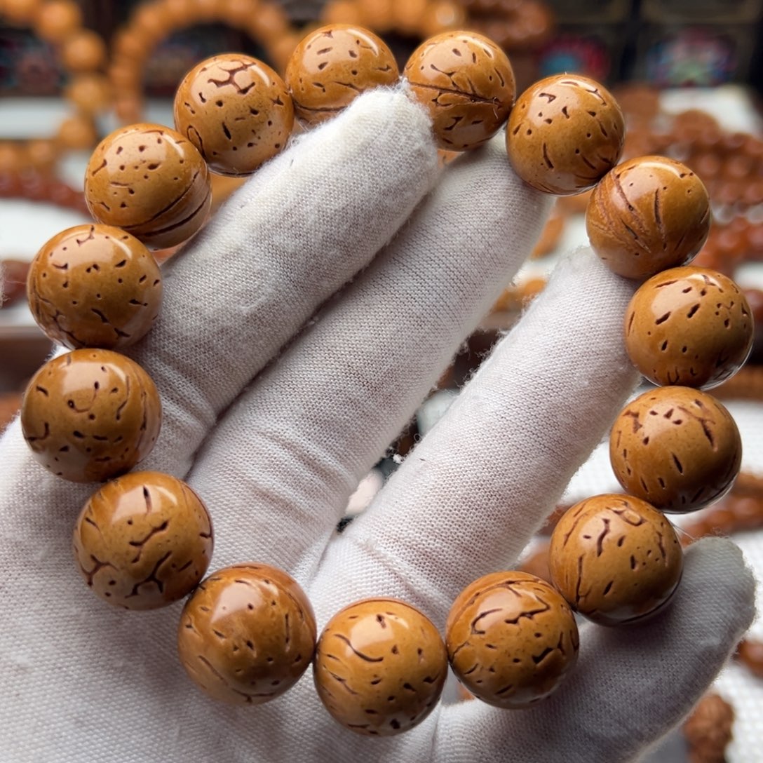 桃核东北野生铁蛋手串