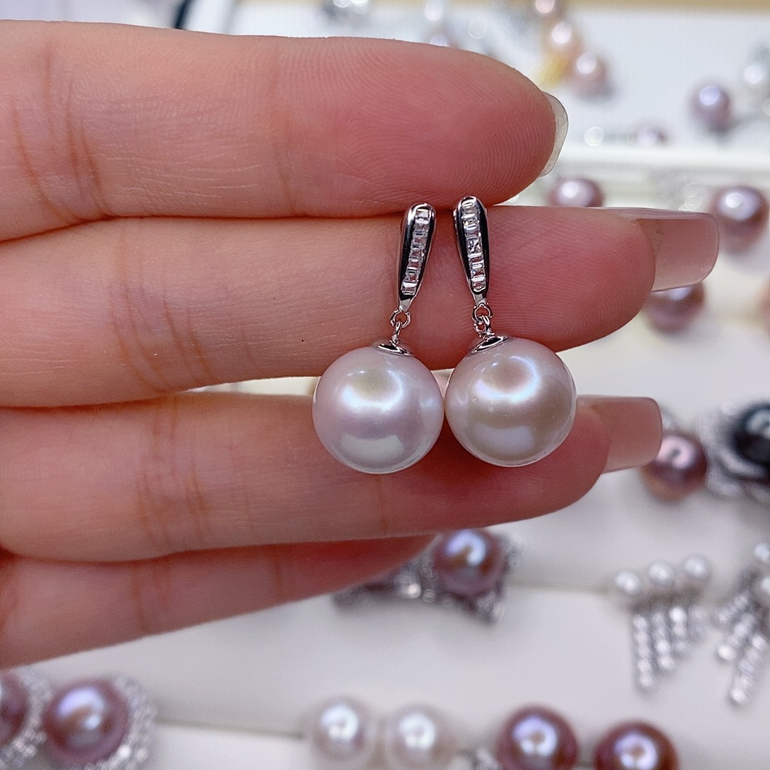 玉***洁银S925镶嵌淡水珍珠耳饰
