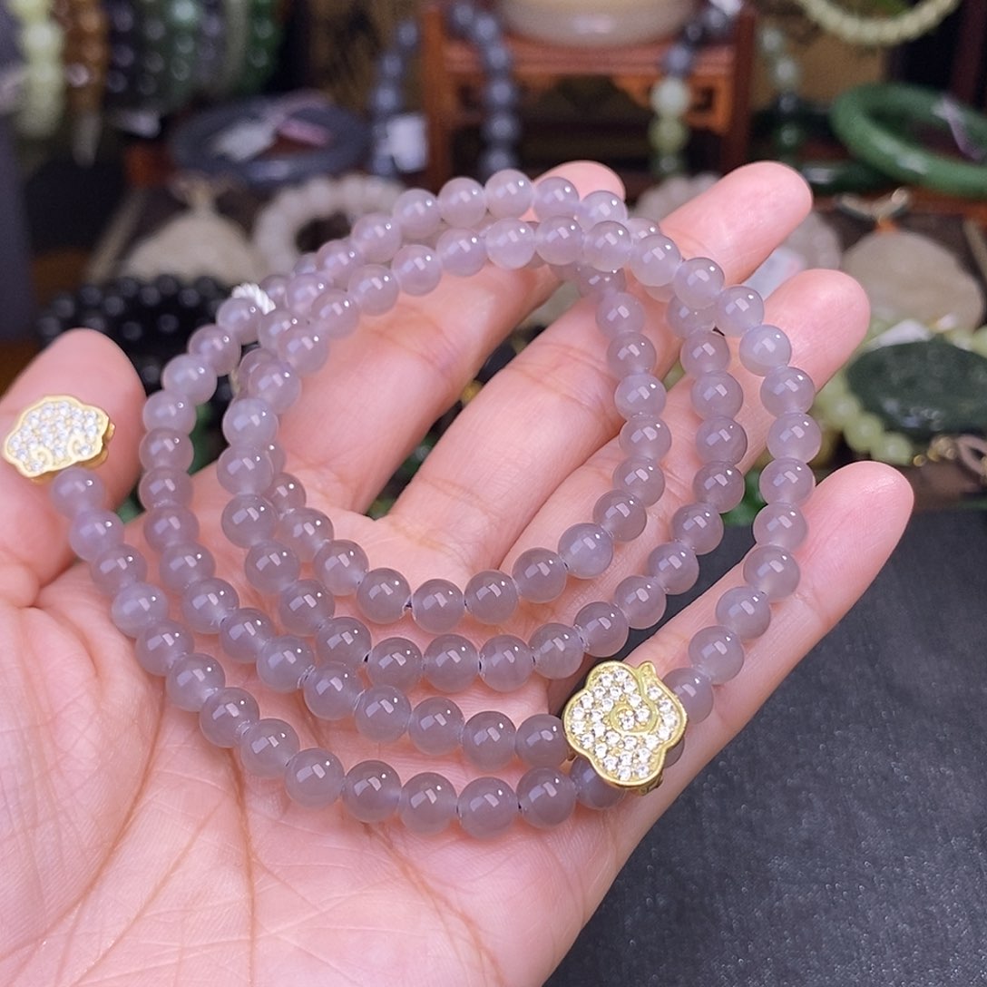 和田玉未镶嵌烟紫清货价珠串约6MM