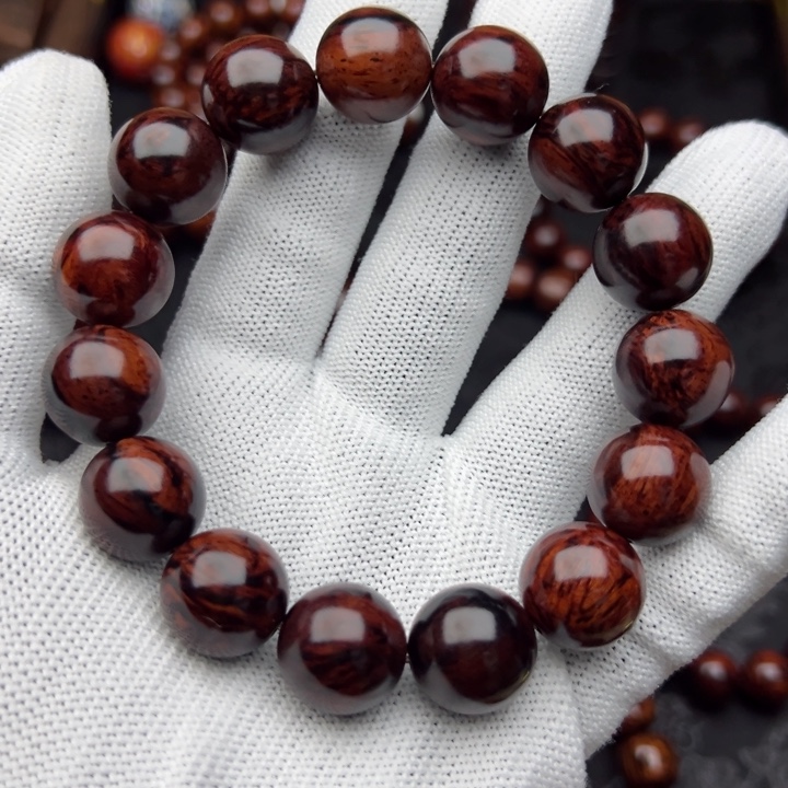 木海南红降1.5黑金满油圆珠精品