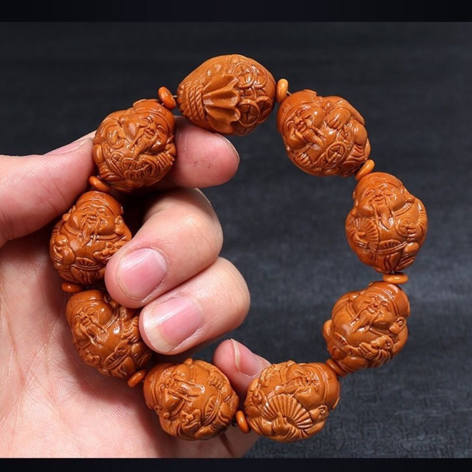 橄榄核雕刻元甲财神油性实足规格大约2.5