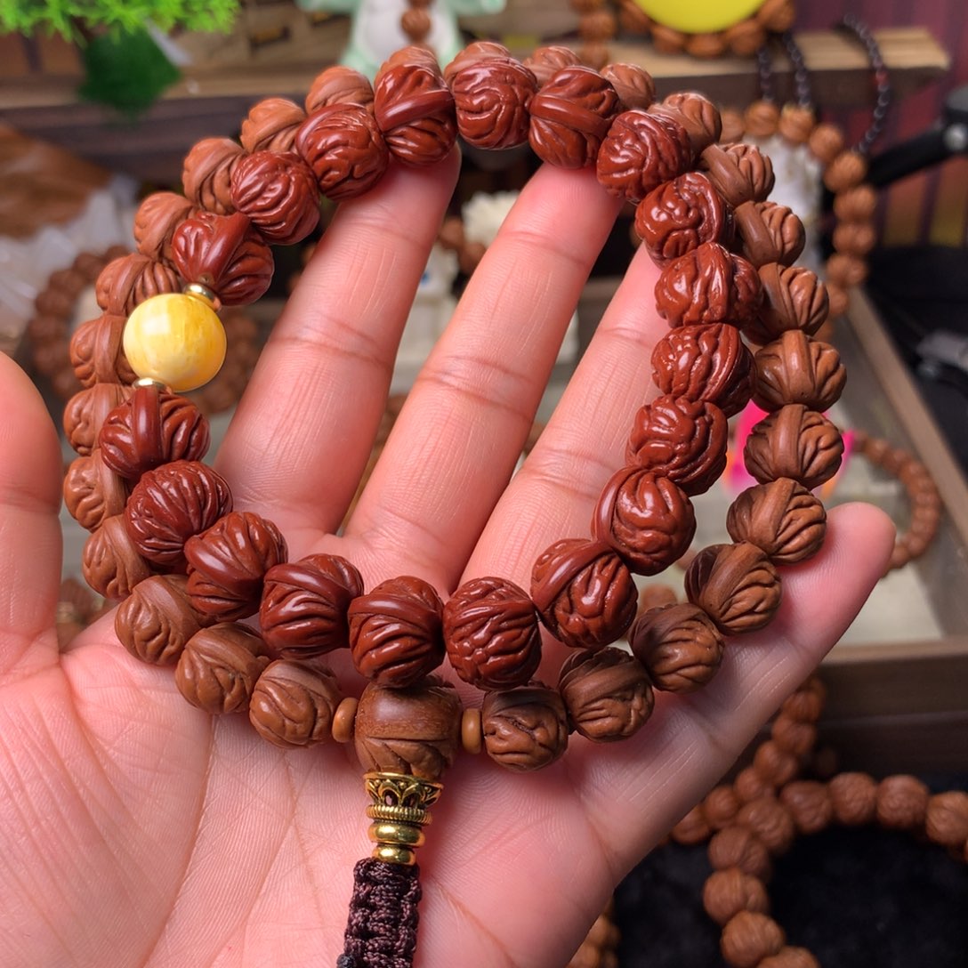 渊***爻吊坠桃核双脊龙手持13