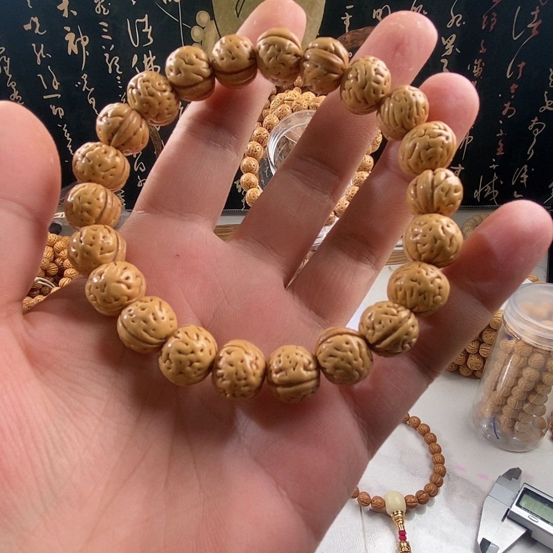 吊坠桃核12盘锦野生爆肉肌肉纹桃核手持