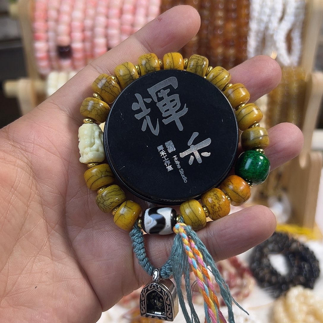 凉***.桃核把件1.2牦牛骨单圈