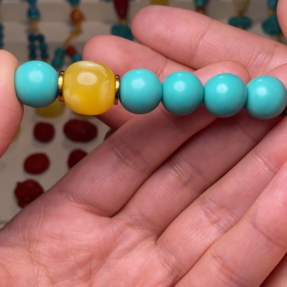 梦***渔琉璃/树脂/塑料类12的圆珠一串配14的腊