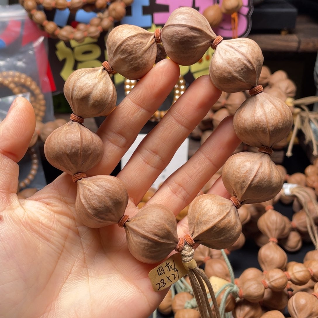 山***泉吊坠橄榄核2829四花铁核